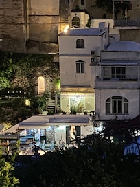 The view of accommodation from across the road over the ravine