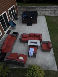 Lovely lower level outdoor seating & hot tub!