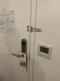 Broken security door guard.