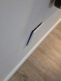 Outlet that looked like it had been on fire.