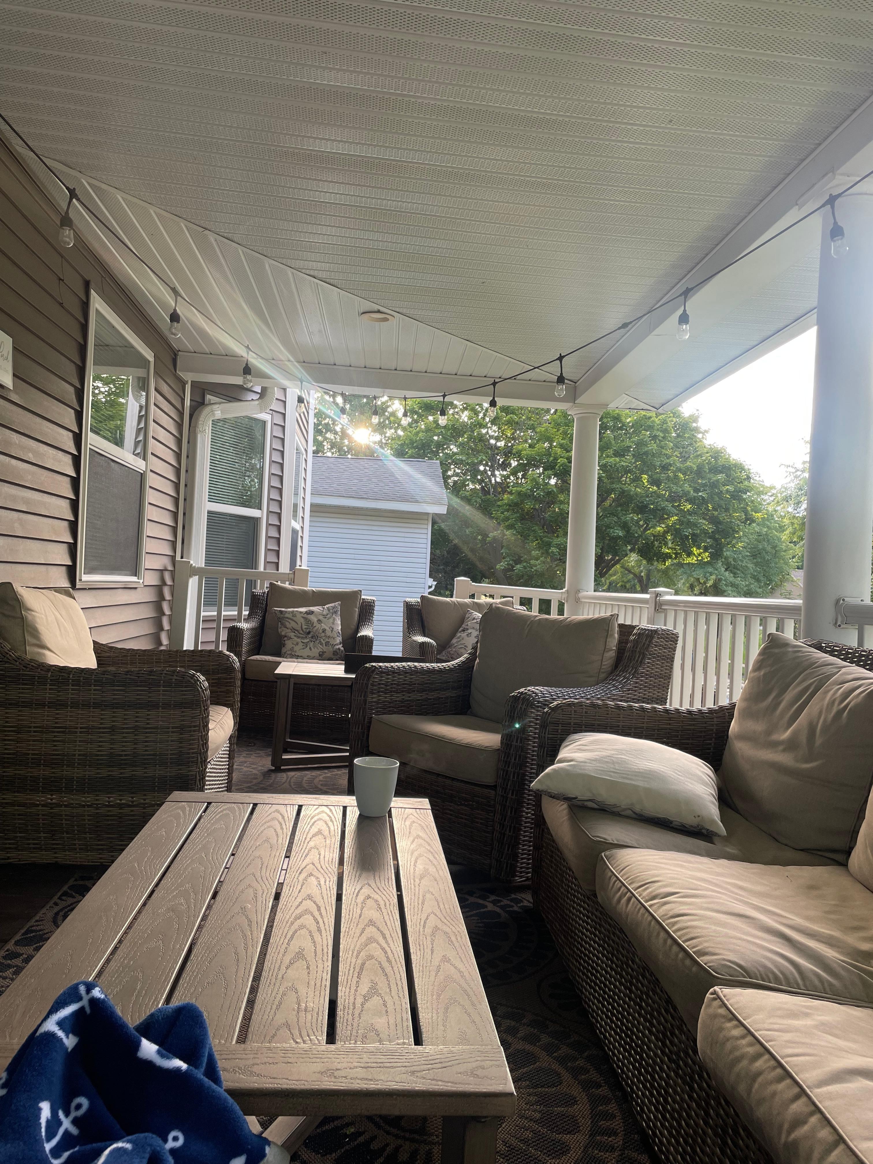 Relaxing drinking coffee on the beautiful wrap around porch