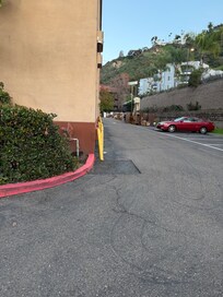 This was the parking area, full of trash, furniture, mattresses.