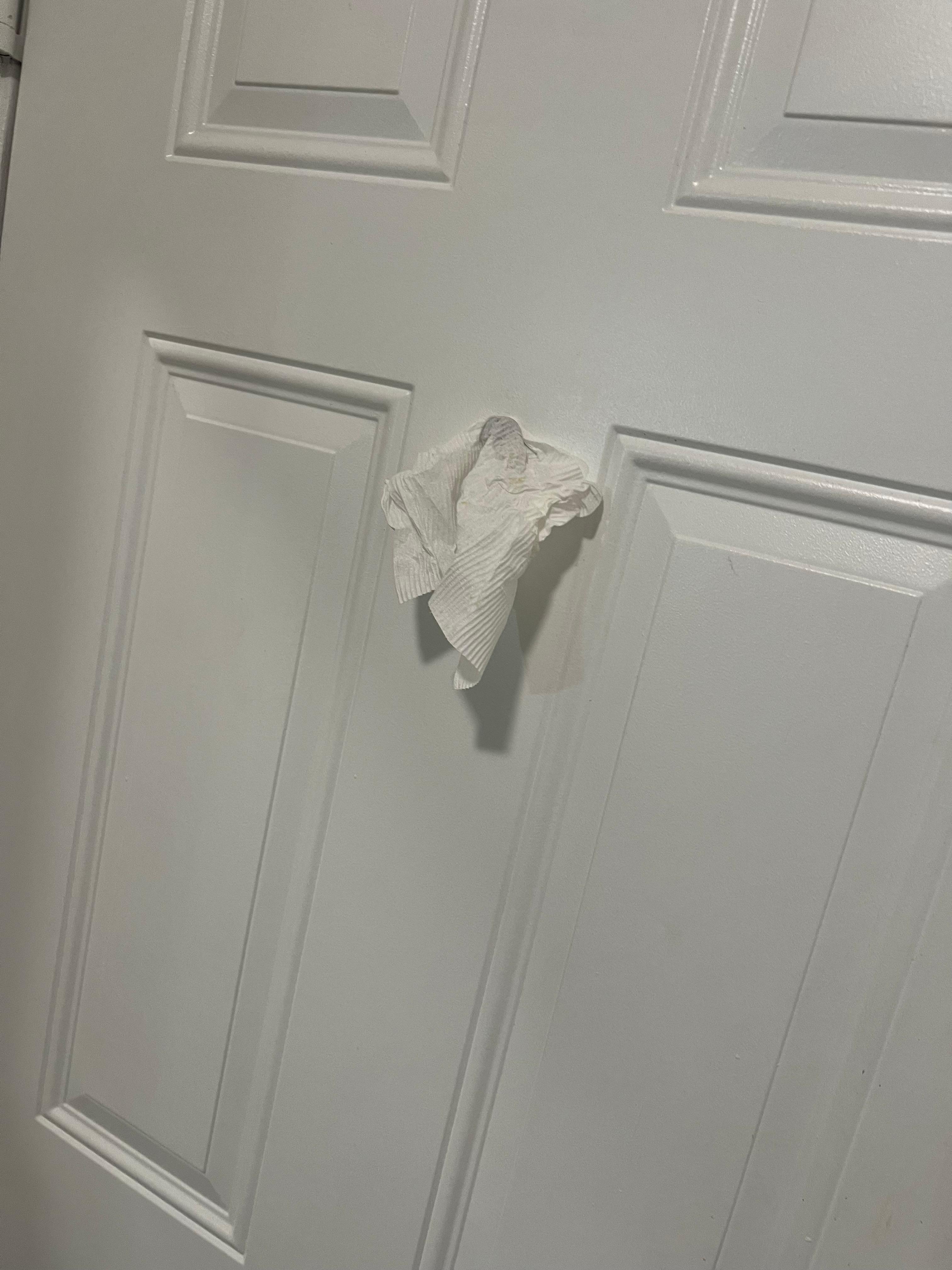 People facing inside the condo from the hallway