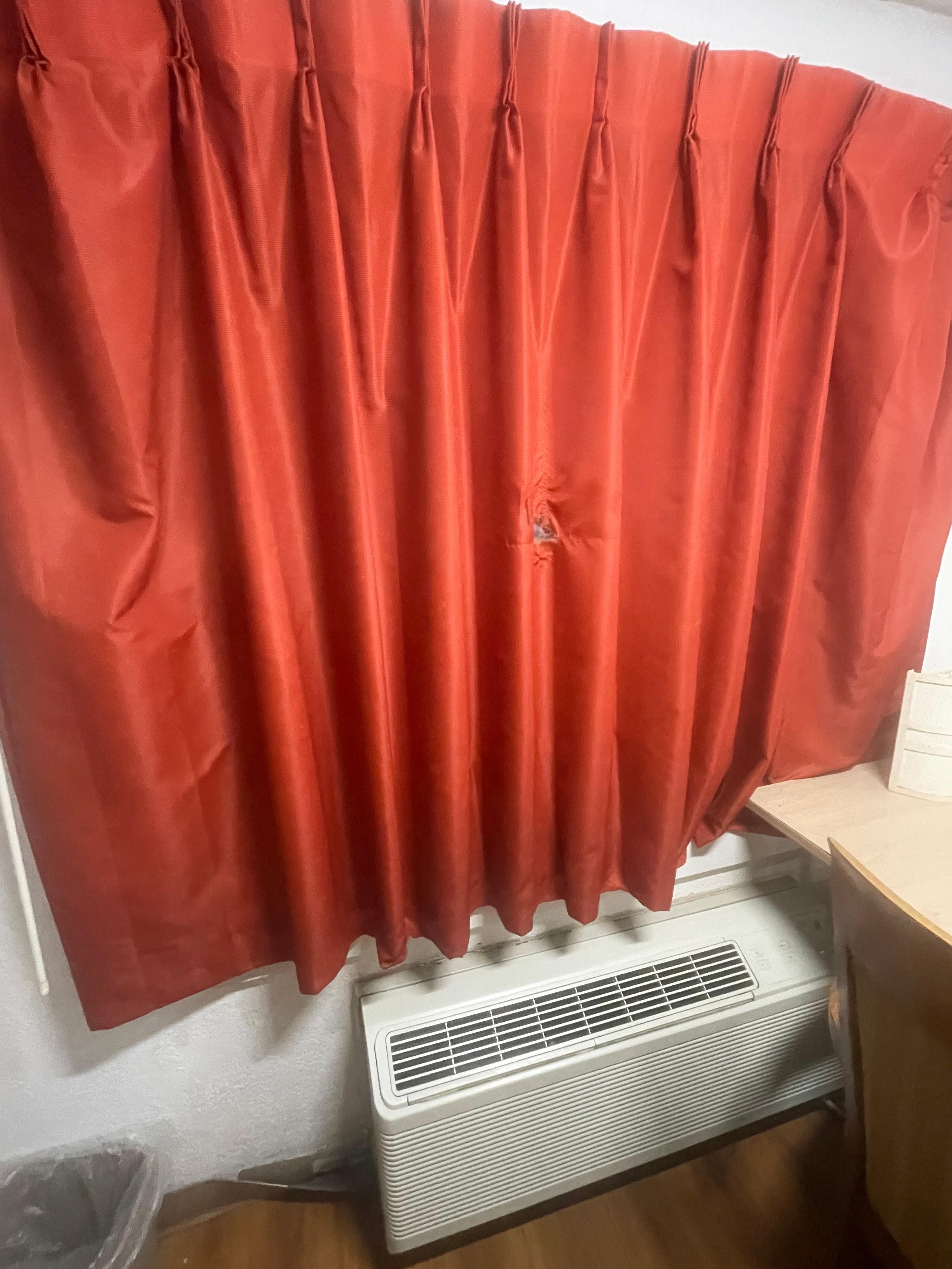 Hole in curtain