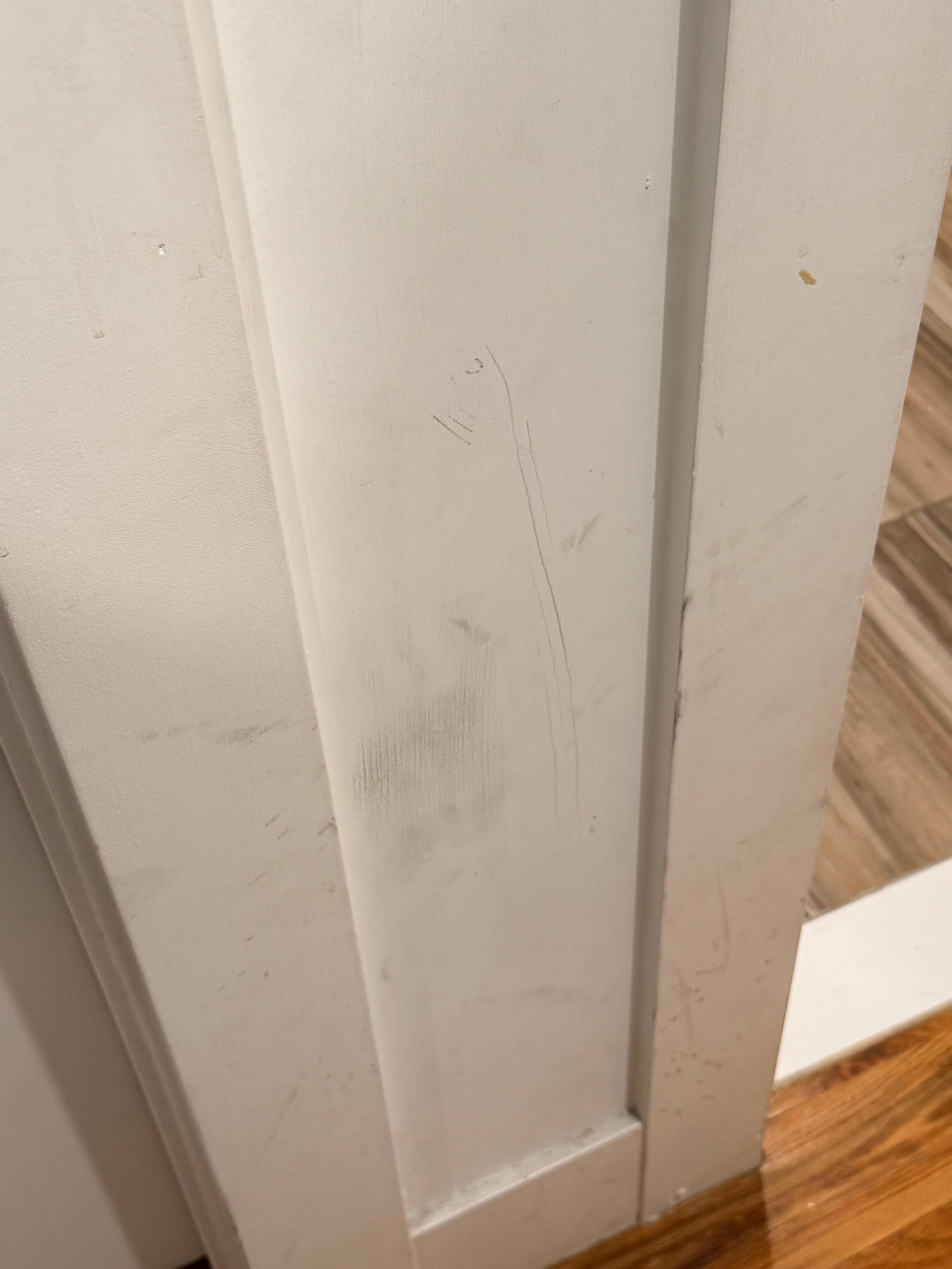 Every wall looks like this. Foot and Finger prints of makeup and idk what