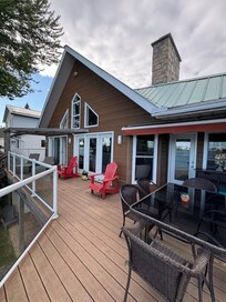 Spacious back deck. Perfect for morning coffee and afternoon drinks.