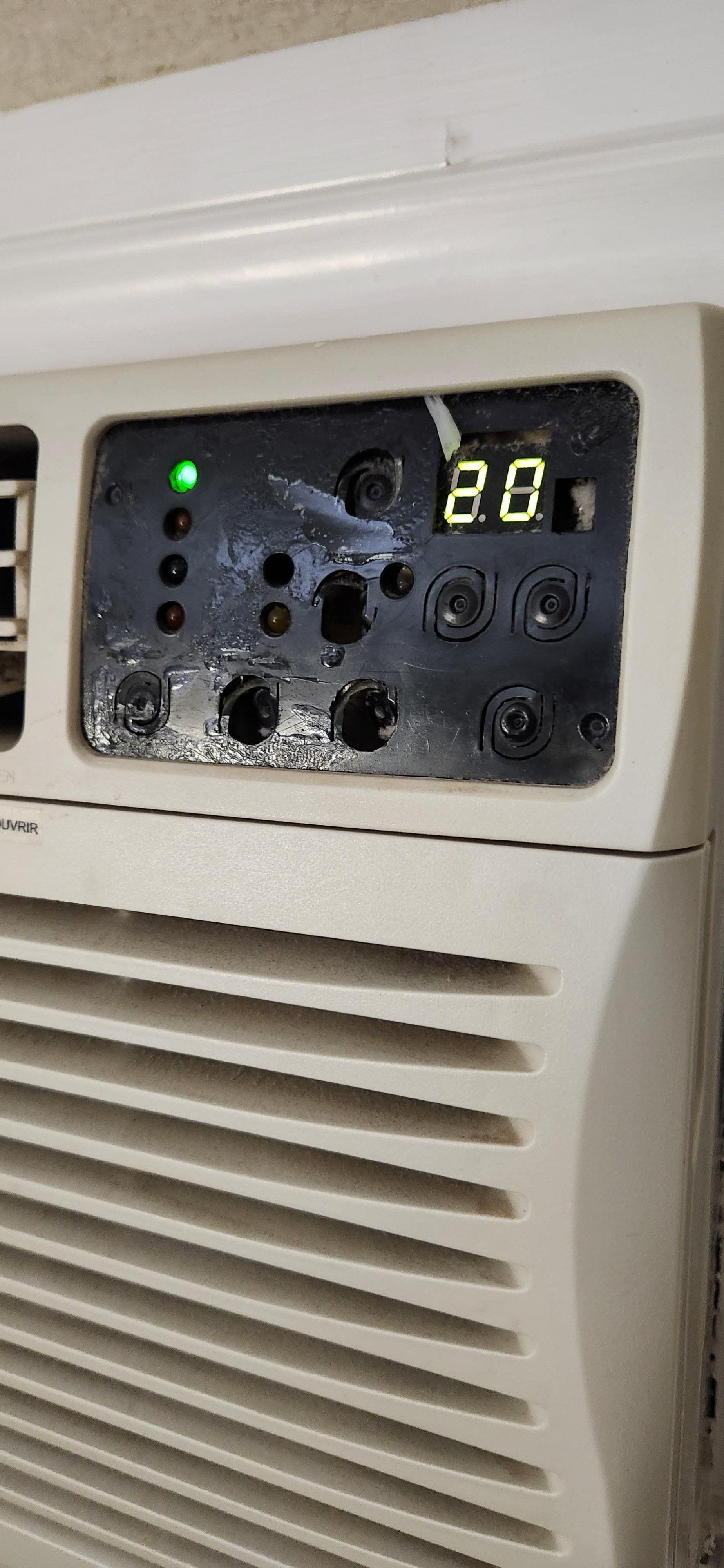 All the buttons were pulled off the AC unit. Good luck on adjusting the temperature. 