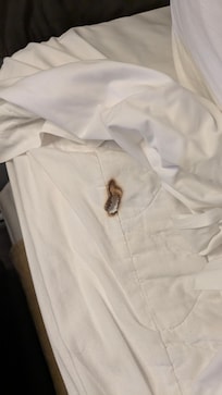 Burn hole in mattress pad