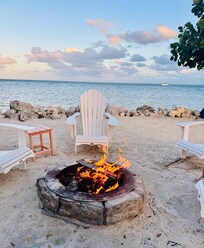 Grilling on the beach and enjoying a fire with the best scenery around!