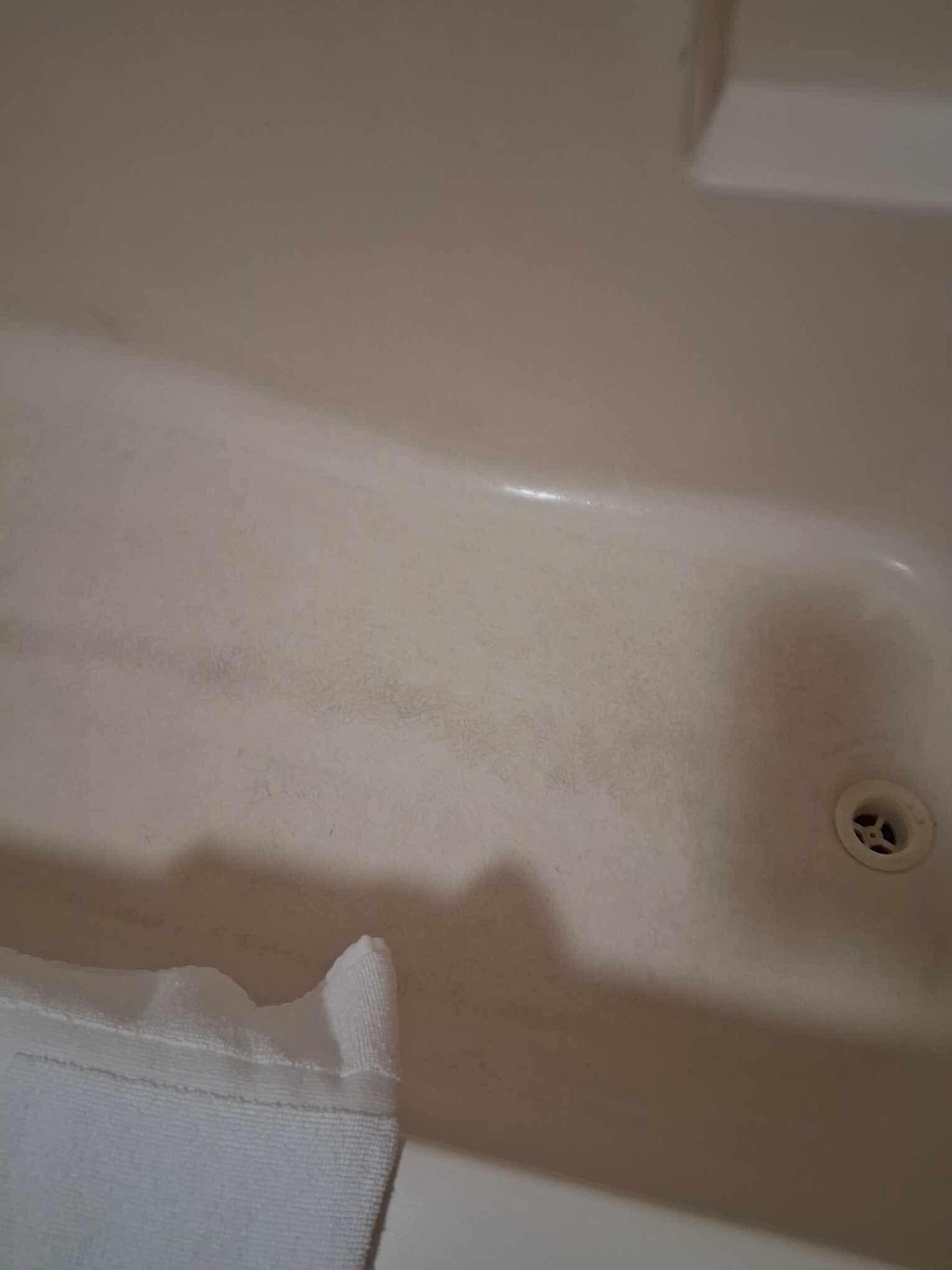 Tub dirty had a film and felt gritty 