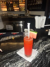 At the bar with our complimentary drink that we didn’t get the night before because we checked in a little later.