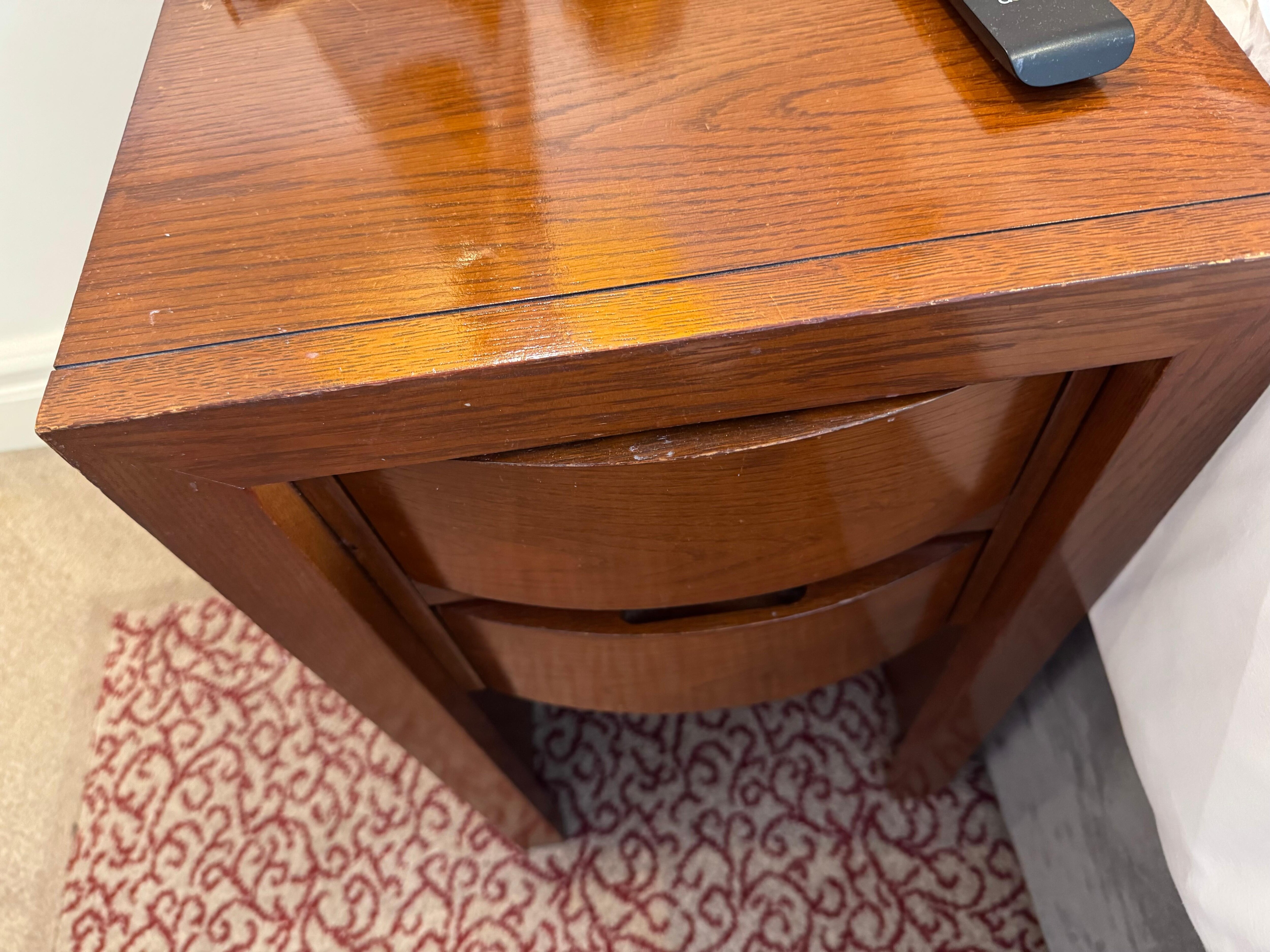Nightstand with chipped edges and worn finish