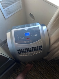 This was the AC in the room which did not blow cold air at all.