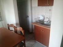 The "Kitchenette" with all the "Cookware, dishware, and utensils"