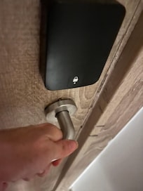 The inside of the door knob was very lose; hard to open door (both sides)