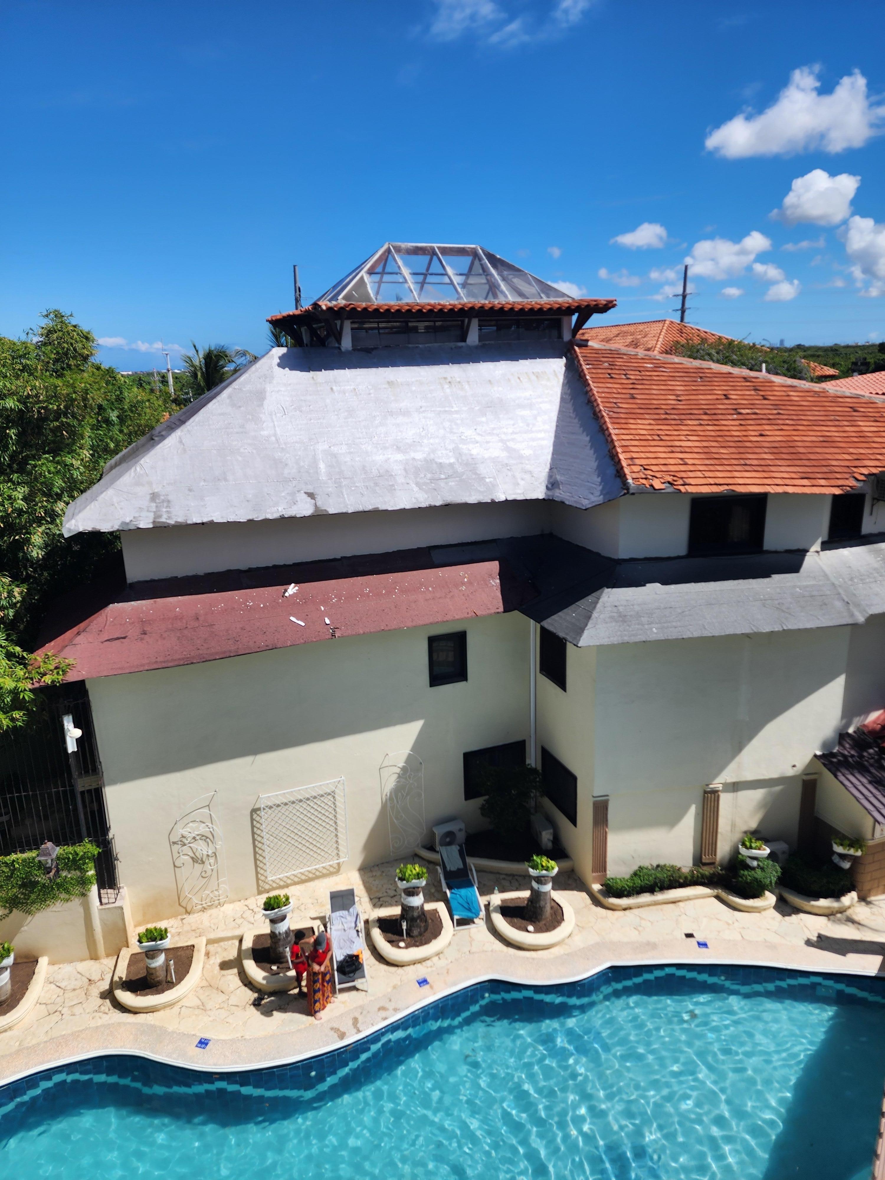 View from our balcony that had no patio furniture. The roof was in bad condition 