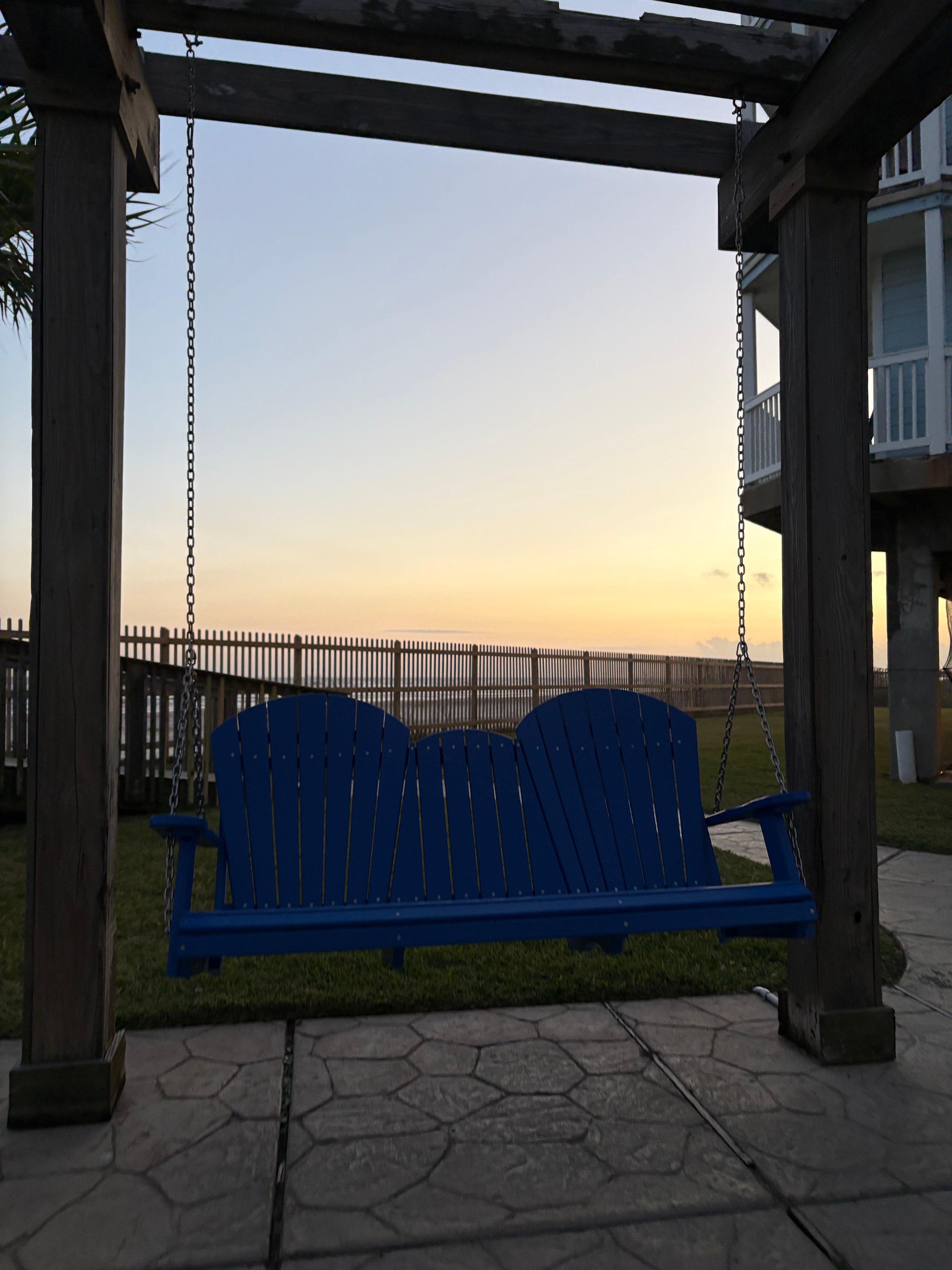 Swings for watching sunset on the beach