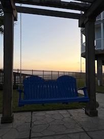 Swings for watching sunset on the beach