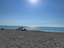 A beautiful day at the property’s beach.