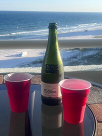 1st Anniversary Toast with wedding champagne on the balcony over looking the beach…perfect!!
