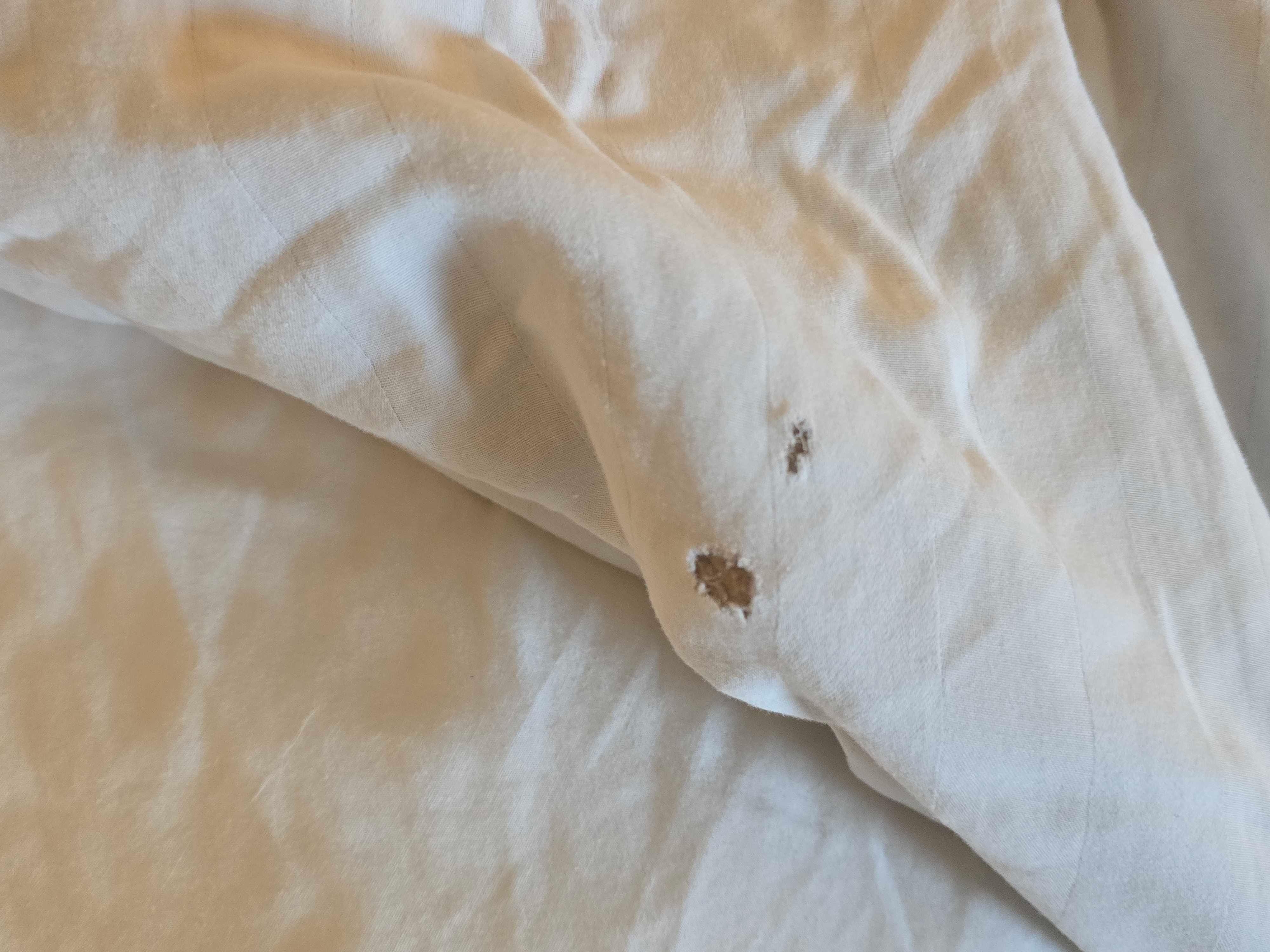 burn(?) holes in sheets