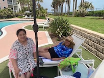 Golden Girls lounging poolside