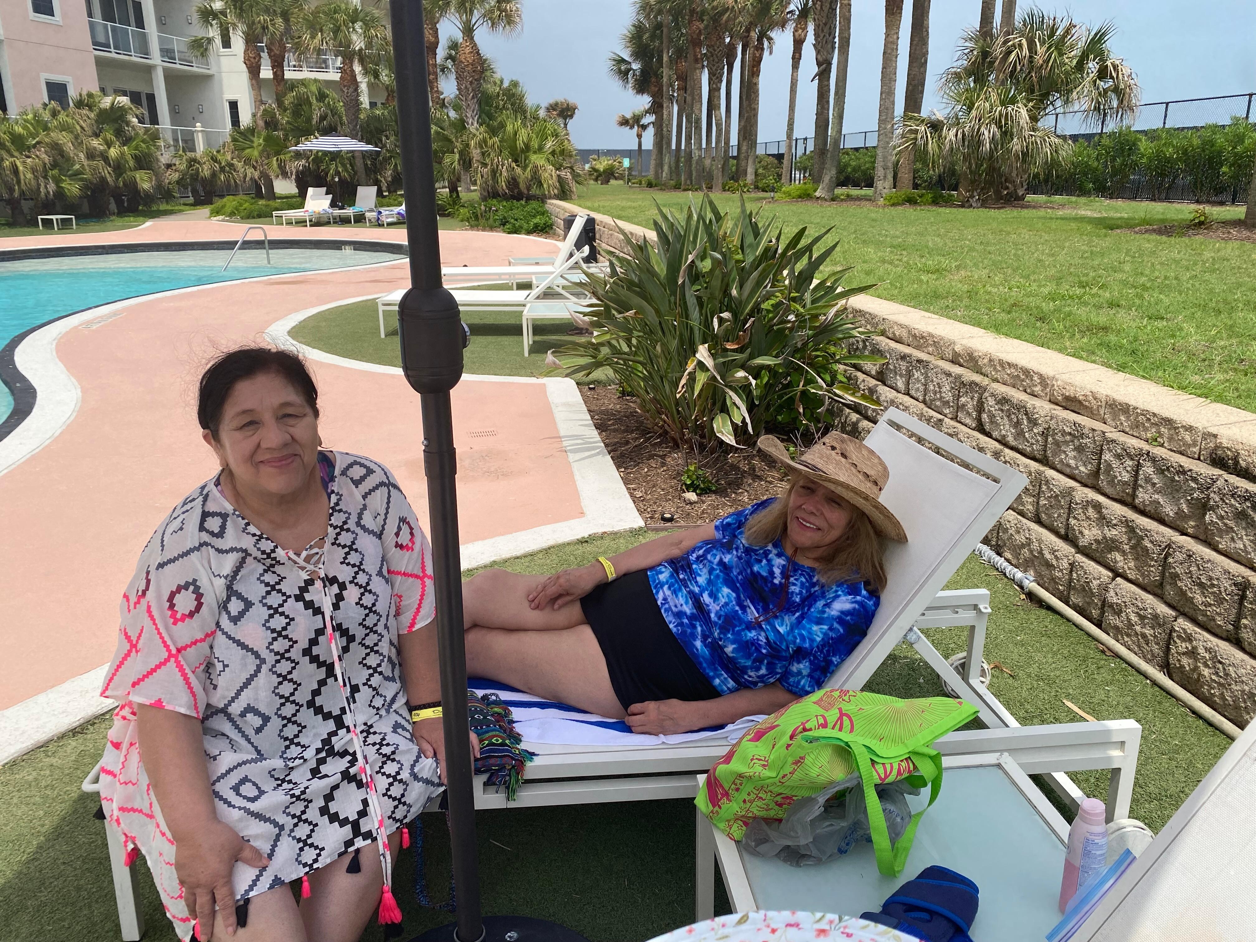 Golden Girls lounging poolside 