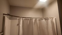 Broken shower rod and used soap in bathrooms.