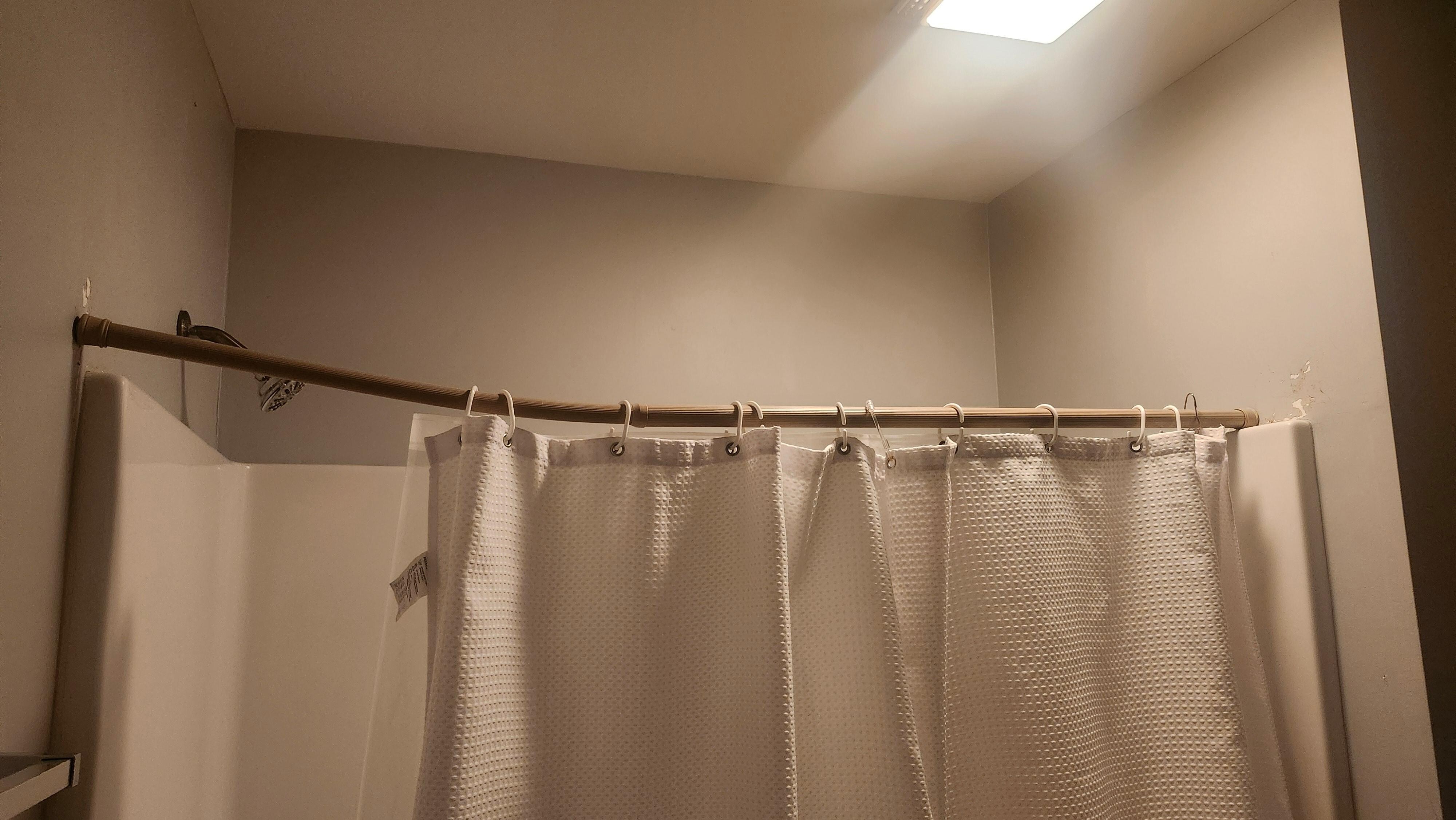 Broken shower rod and used soap in bathrooms.