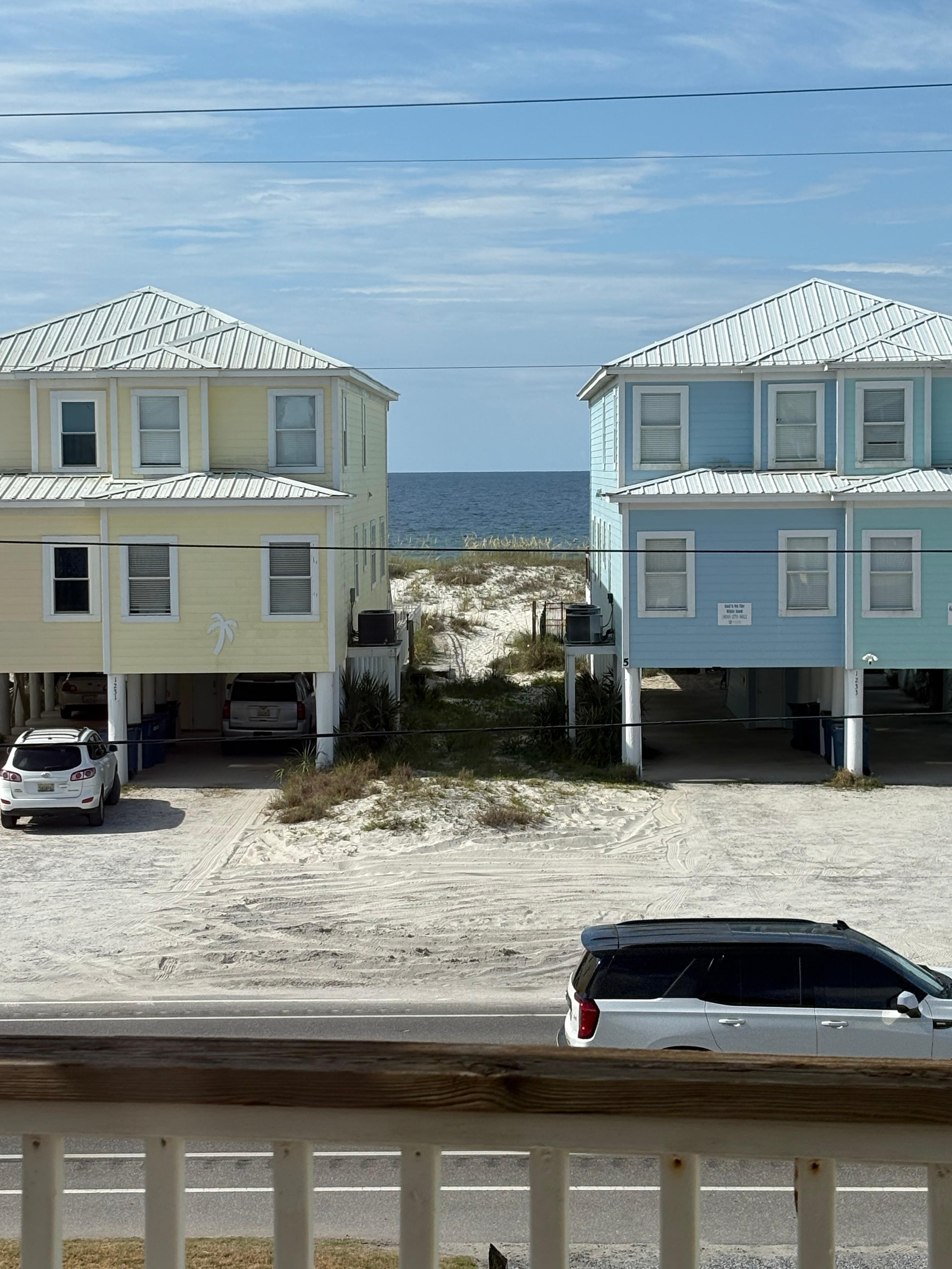 Upstairs bedroom /deck view of beach 