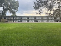 Great grass area with bbq and picnic benches.