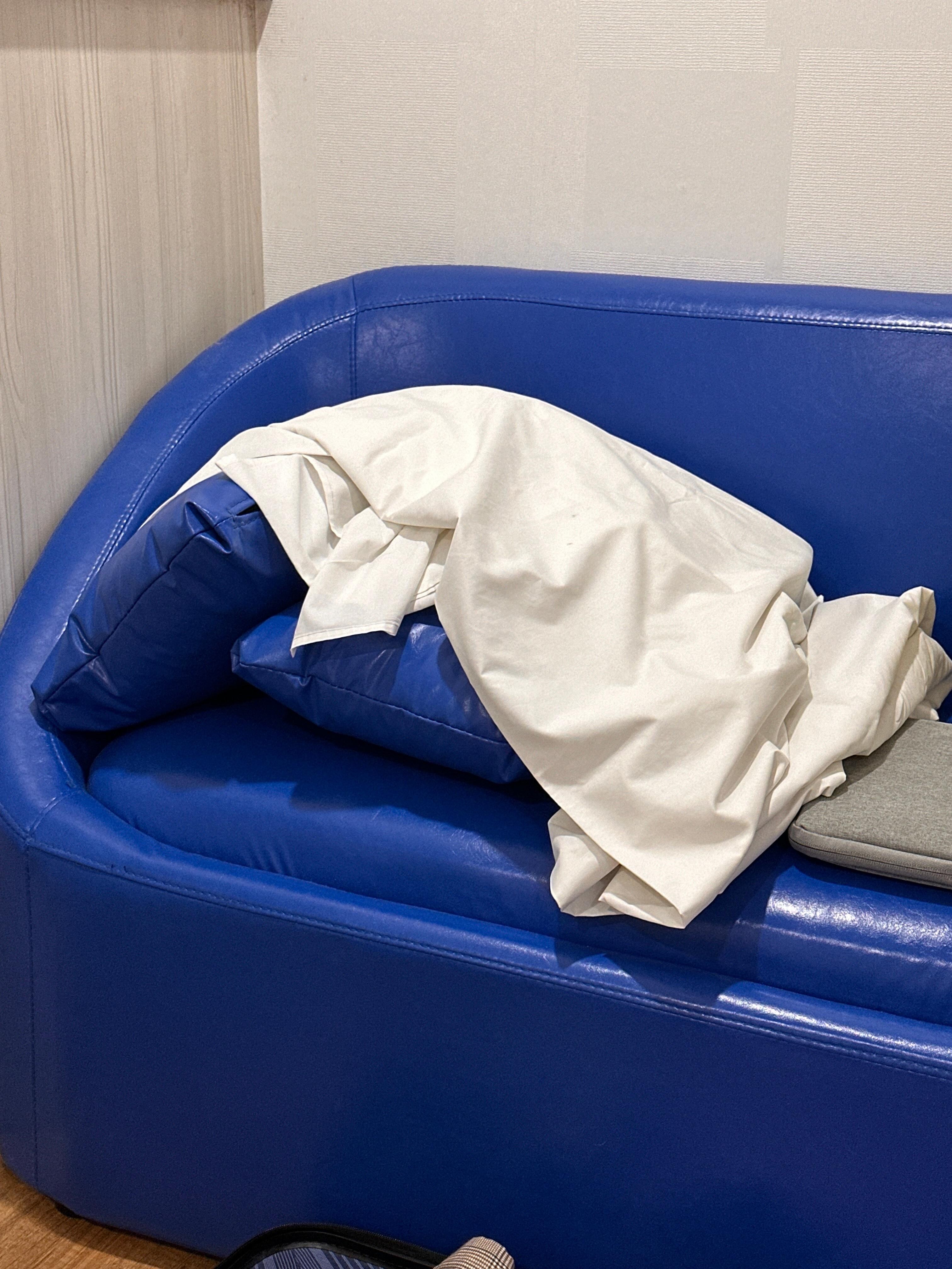 random dirty sheets on the couch 