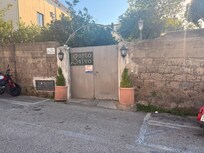 This is the entrance, takes long time to open and the reception is filty, not even 1 star hotel. Nocked at the gate for 10 minutes and did not open , rango the bell and spoke thru the camera and after 30 they oponed the door.