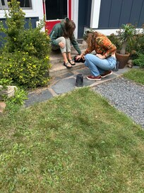 Petting the friendly cat at Sky Fire