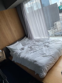 Big bed. (This was taken while checking out so it was not fully made)