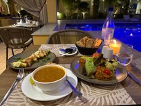 Delicious meal served at the pool house. Excellent service.