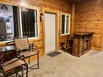 Each room had a bar top with stools and a small table with chairs just outside the door, which felt private because of the walls on each side.