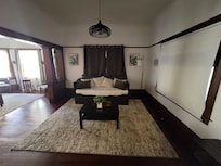 Living area with a conformable day bed and becomes a pull out, making it a good size full bed.