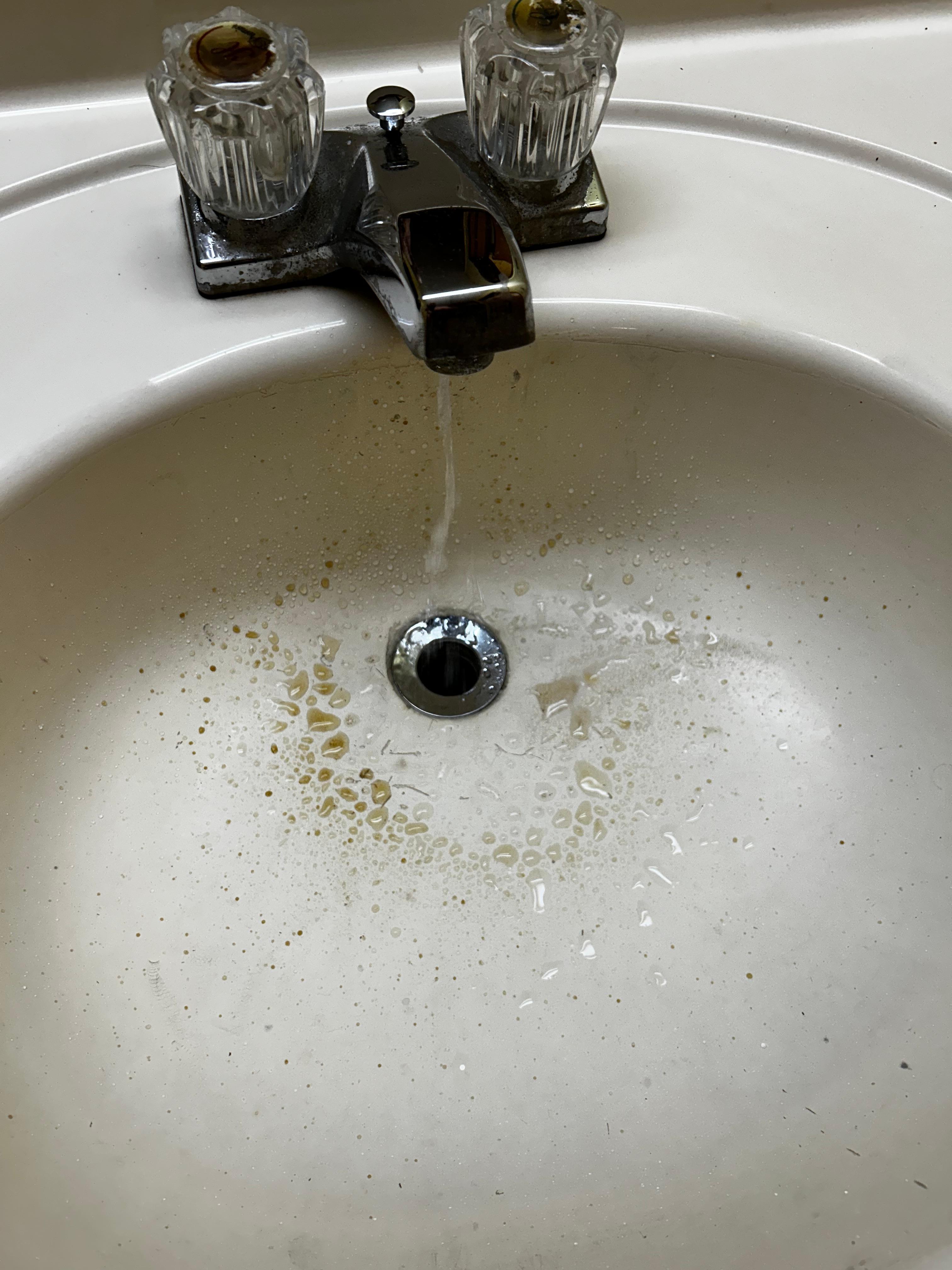 When we turned on the sink in the room, dark brown water came out.