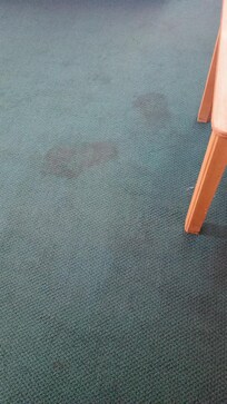 Stained old carpet