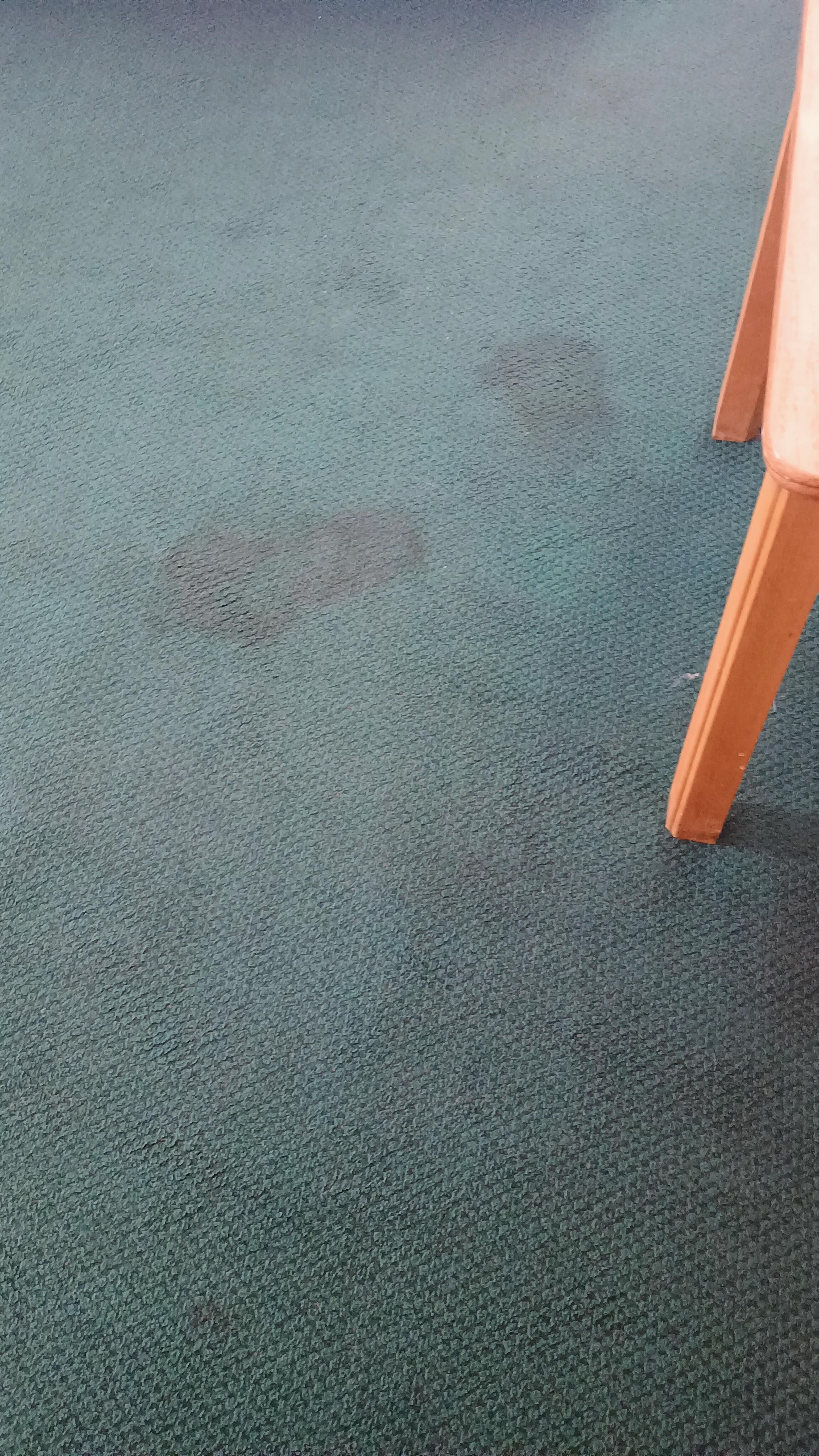Stained old carpet