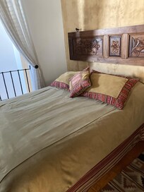 Upstairs: one of the beds