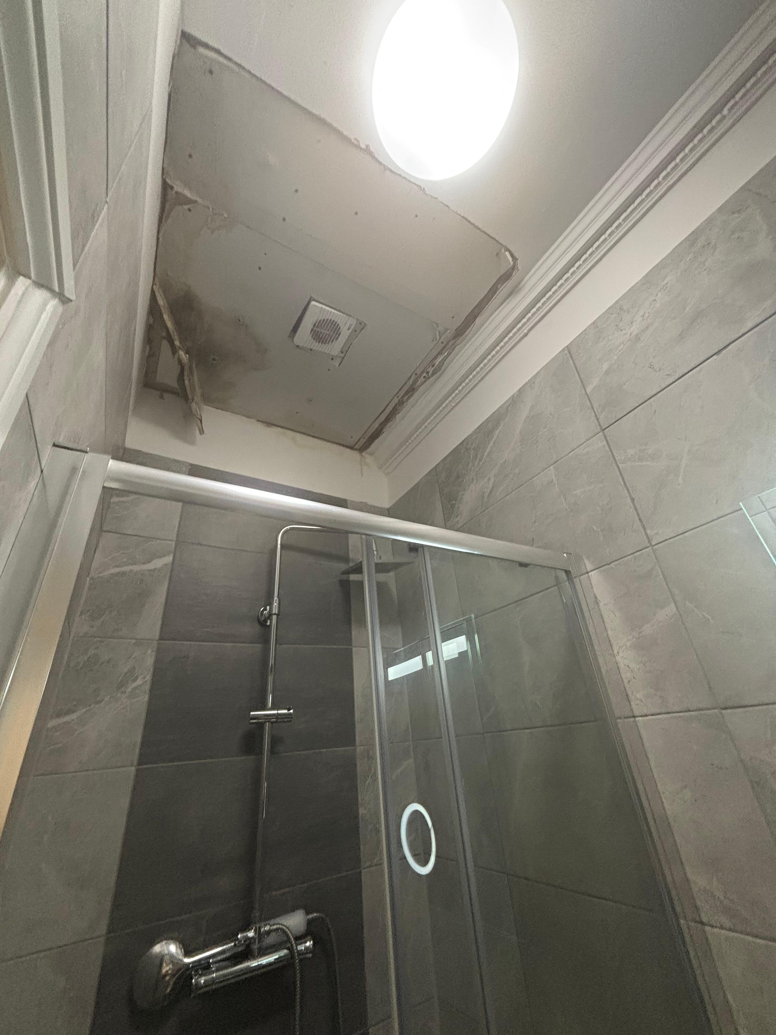 Broken shower unit with hot lava water and no way to turn it down! 