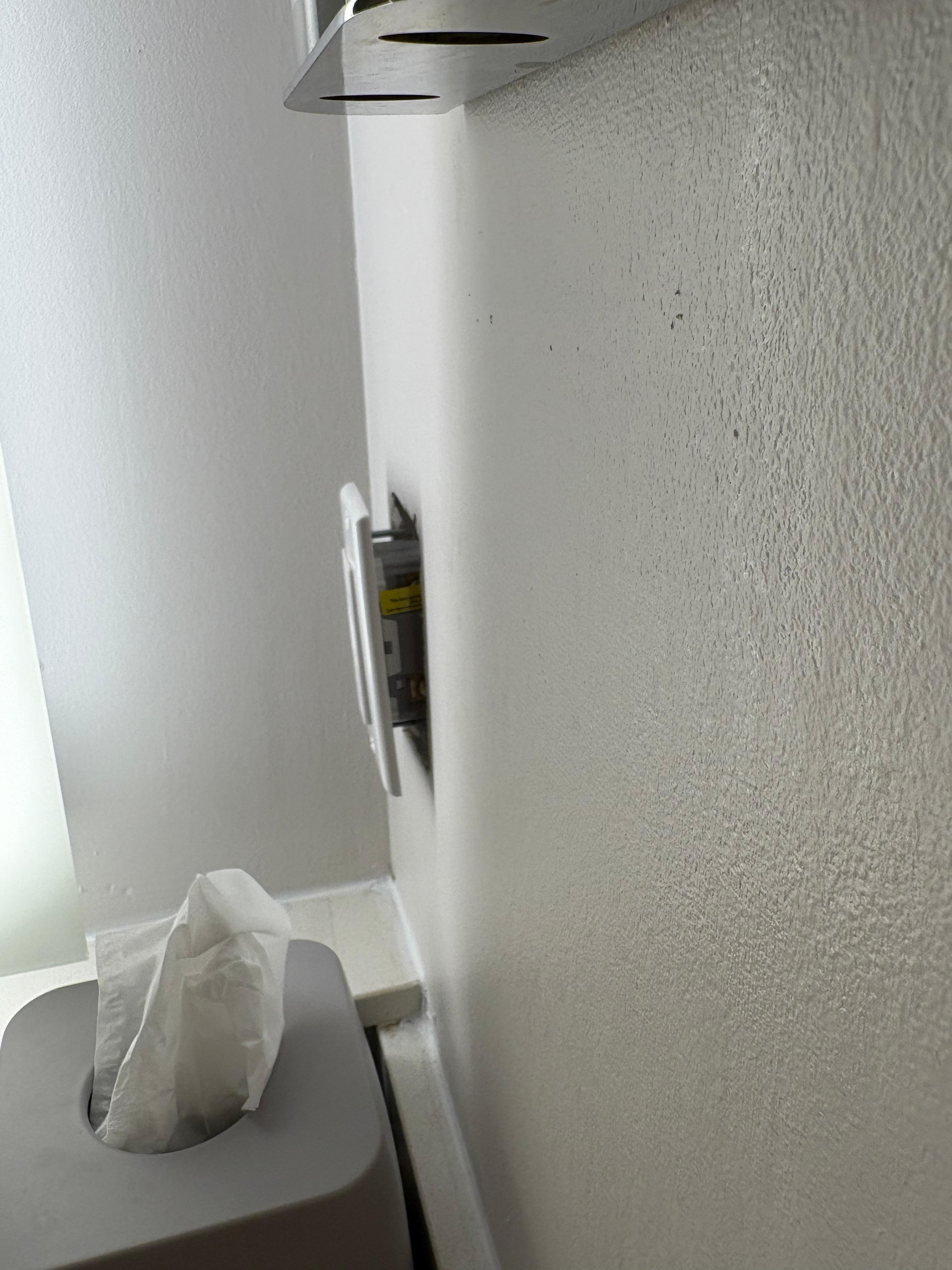 Light socket in bathroom… it was farther out. Tried to push it back in but it wouldn’t go. This is where it stayed.