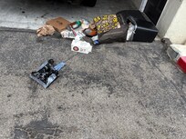Trash outside room.