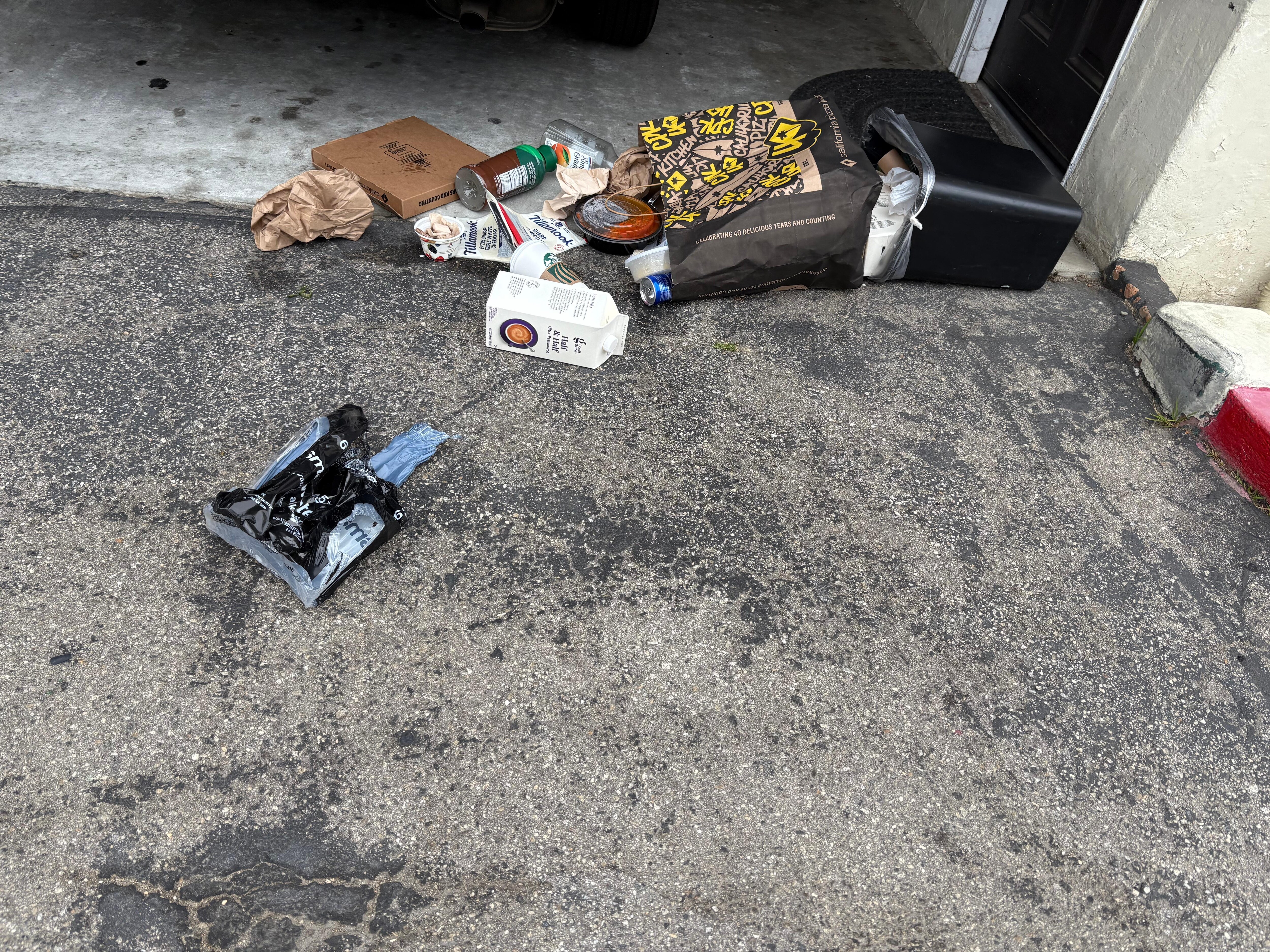 Trash outside room.