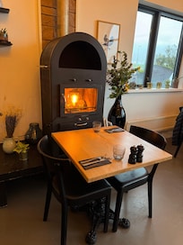 Cosy fireplace in the dining room