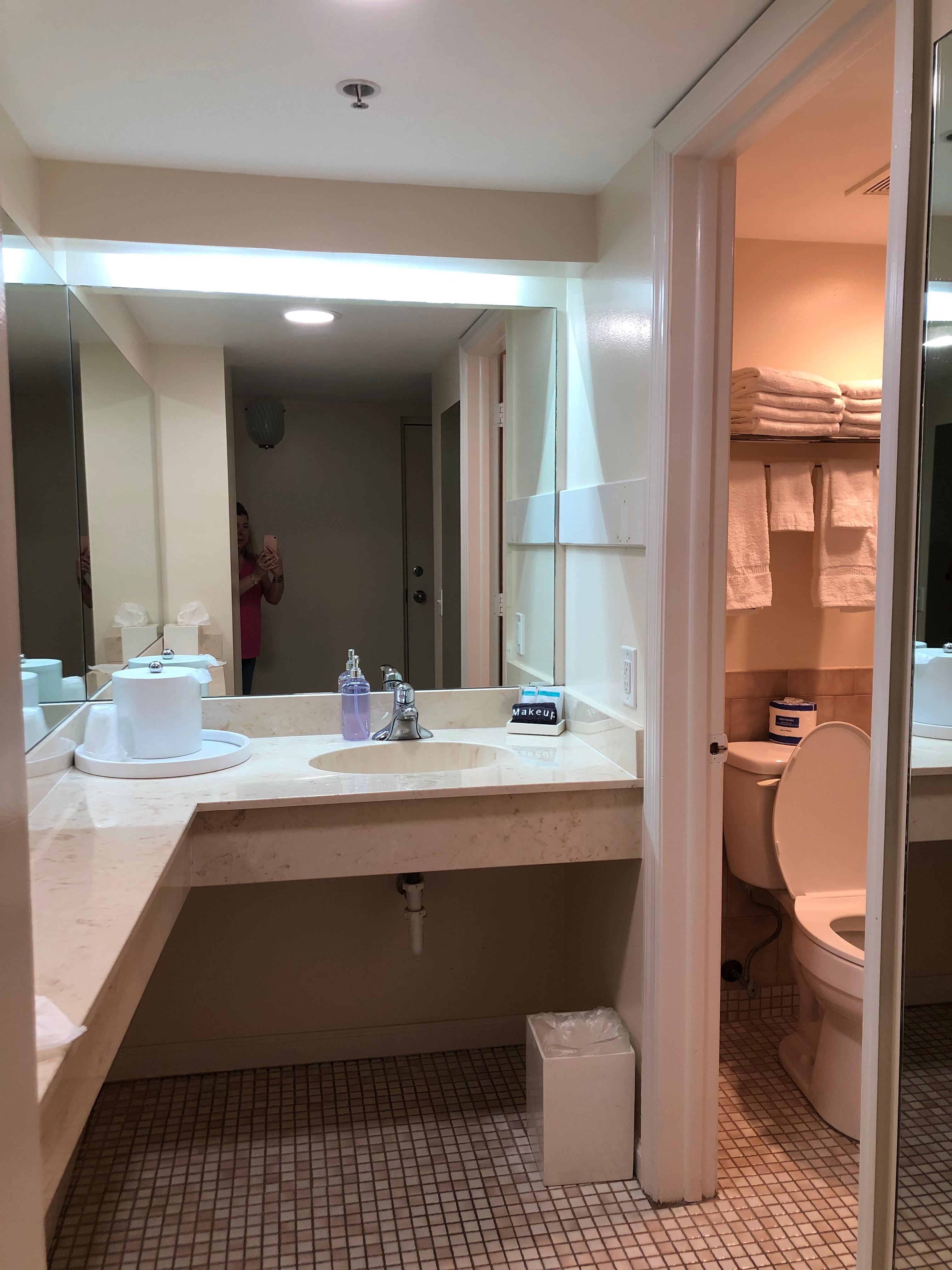 Separate sink/makeup area from shower and toilet.