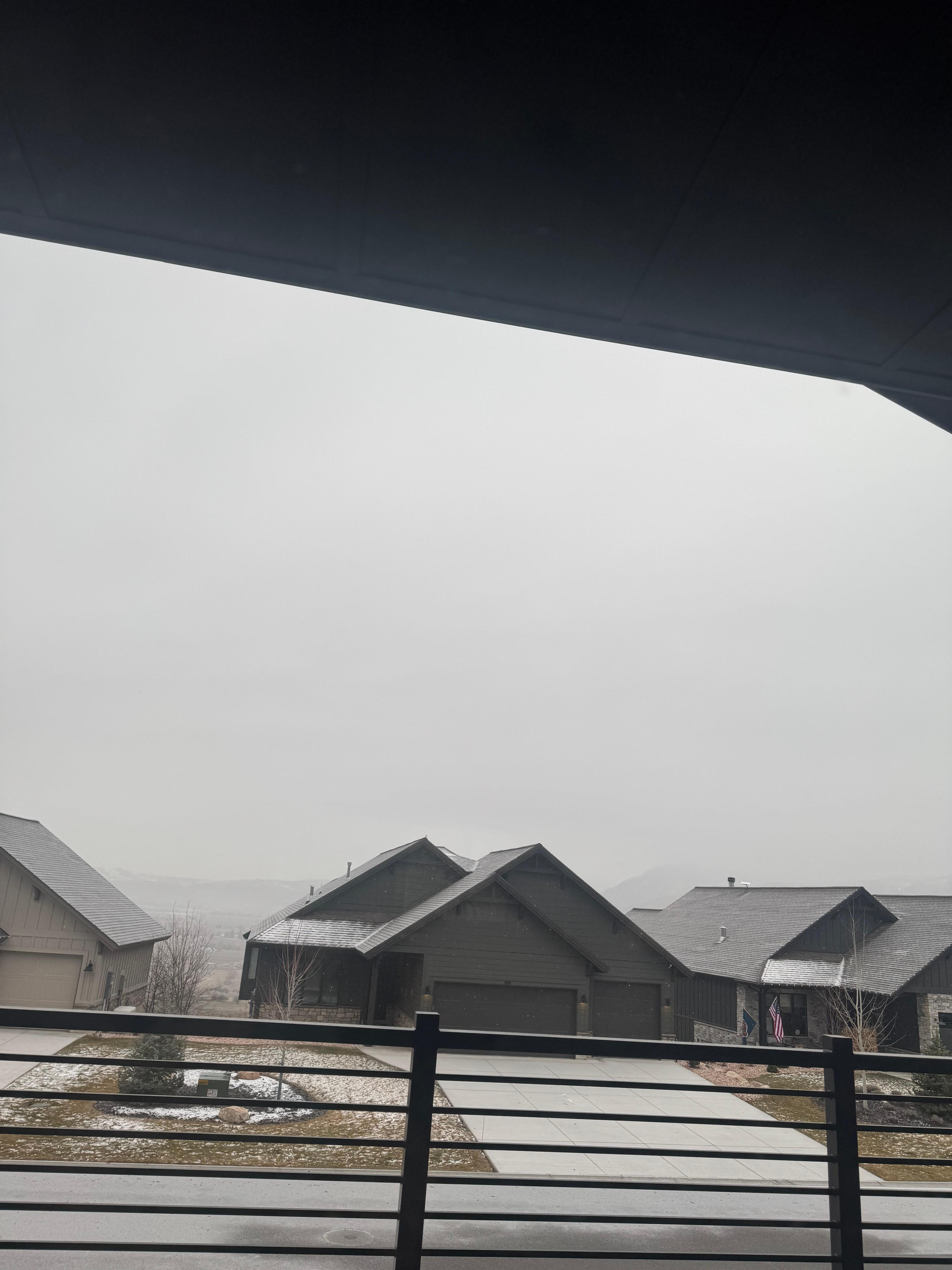 View from house. Snow clouds rolling in so mountain hard to see
