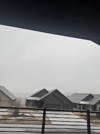 View from house. Snow clouds rolling in so mountain hard to see